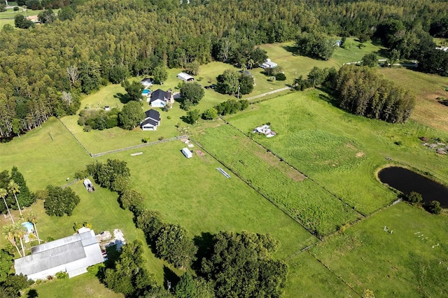 birds eye view of property featuring a rural view