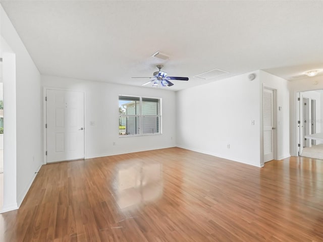 interior space featuring light wood-type flooring and ceiling fan