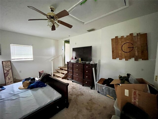 carpeted bedroom featuring ceiling fan