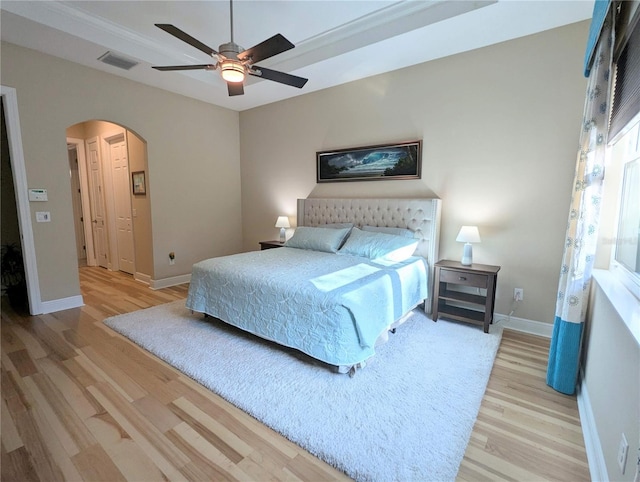 bedroom featuring light wood-type flooring and ceiling fan