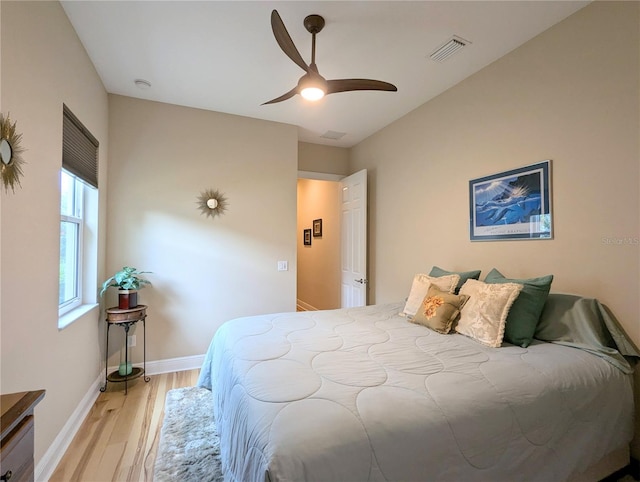 bedroom featuring light hardwood / wood-style flooring and ceiling fan