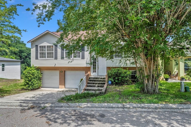 bi-level home featuring a garage