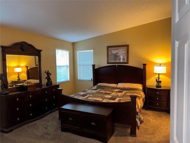 bedroom with lofted ceiling, carpet floors, and a textured ceiling