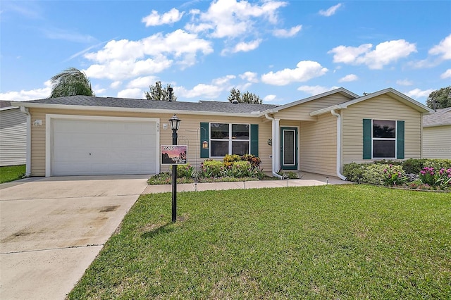 single story home with a garage and a front yard