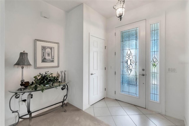 entryway featuring light tile patterned floors