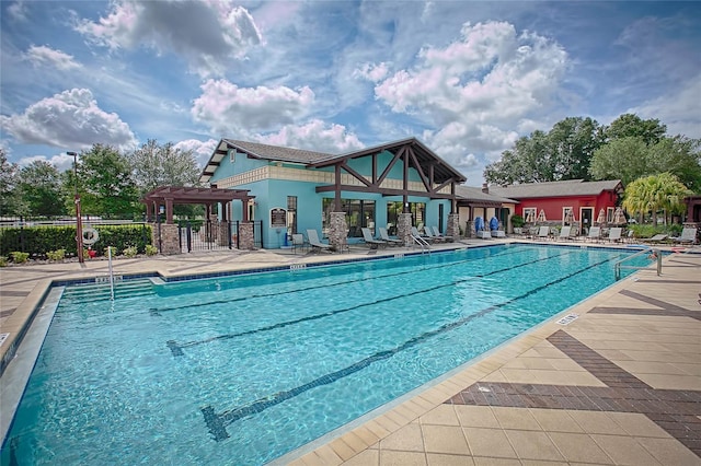 view of pool featuring a patio area