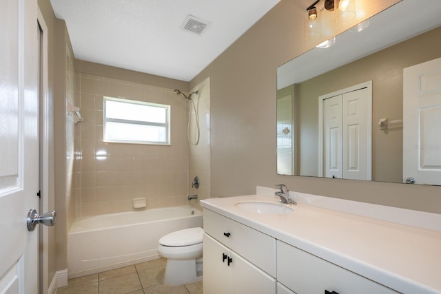 27303 Gingerbread Pl, Leesburg, FL 34748 - bathroom featuring vanity, shower / washtub combination, toilet, and tile patterned floors