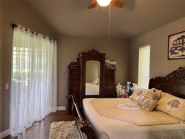 bedroom featuring dark wood-type flooring and ceiling fan