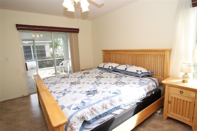 bedroom featuring ceiling fan and access to exterior