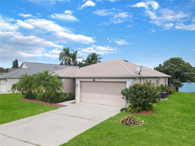 ranch-style house featuring a front yard, an attached garage, concrete driveway, and stucco siding