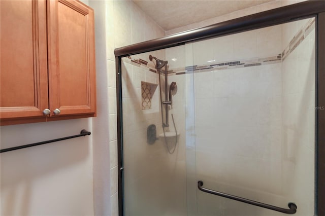 full bathroom with a stall shower