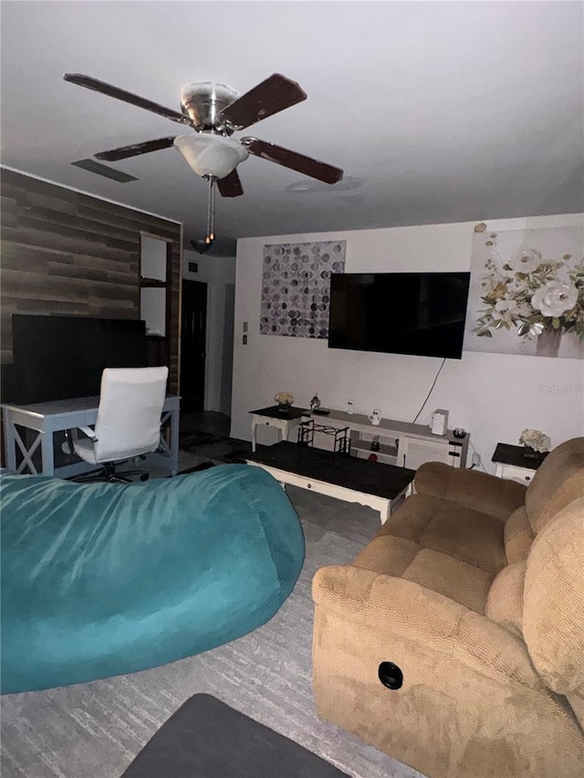 living room with ceiling fan