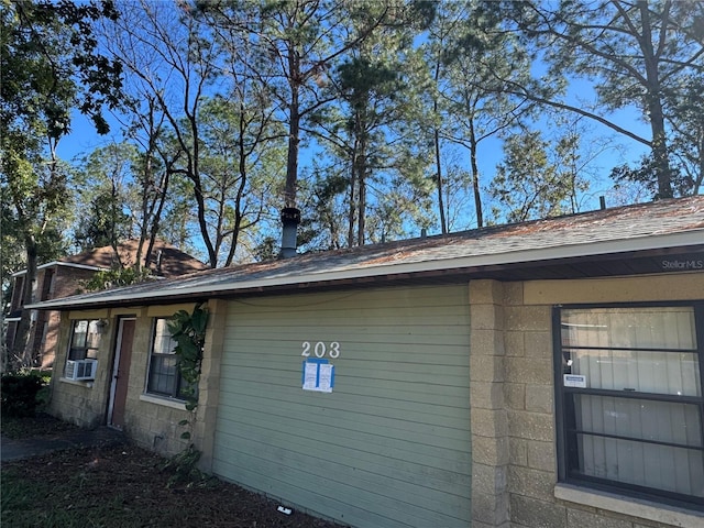 view of property exterior with cooling unit