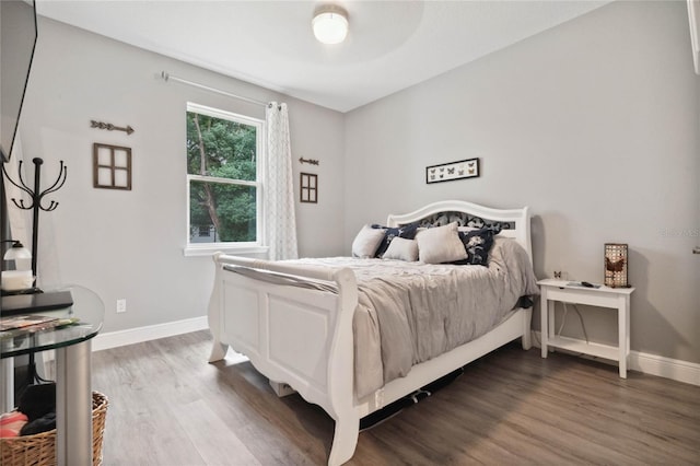 bedroom featuring hardwood / wood-style floors