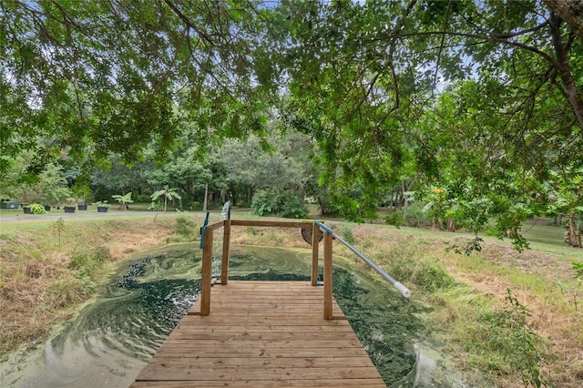 view of dock with a water view