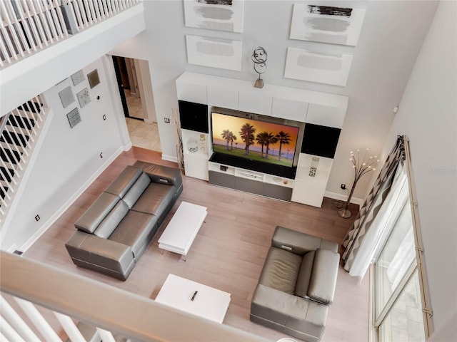 living room featuring a high ceiling