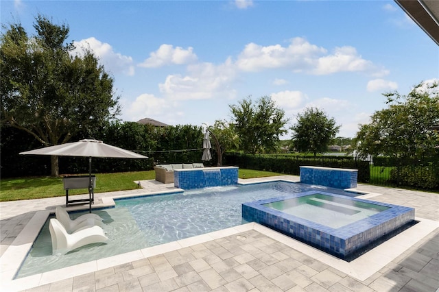 view of swimming pool featuring an in ground hot tub, pool water feature, and a patio area