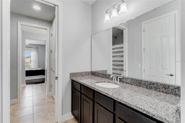 bathroom featuring tile patterned floors and vanity