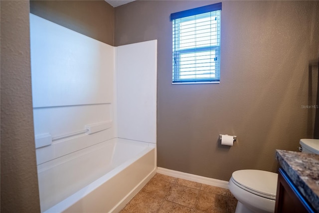 full bathroom featuring shower / bath combination, toilet, vanity, tile patterned flooring, and baseboards