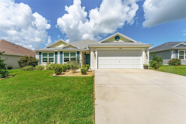 ranch-style home featuring a front lawn and a garage