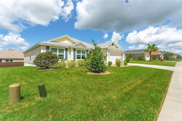 ranch-style home featuring a front lawn and a garage