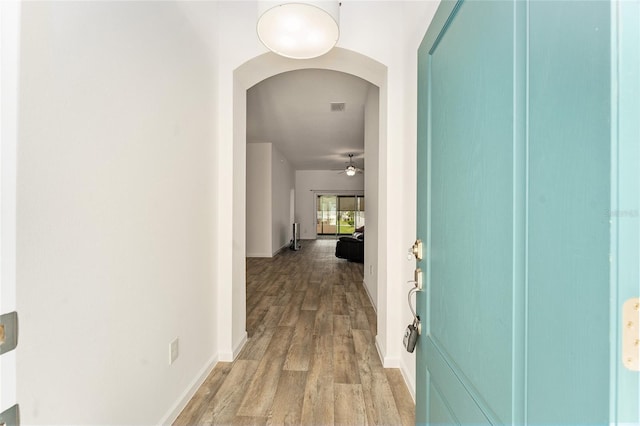 corridor featuring light hardwood / wood-style flooring