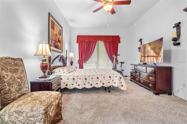 bedroom with ceiling fan and carpet flooring