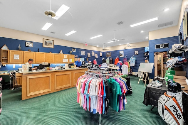 miscellaneous room with ceiling fan, carpet, and visible vents