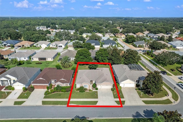 birds eye view of property with a residential view