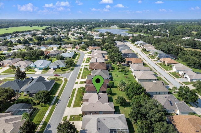 aerial view featuring a residential view and a water view