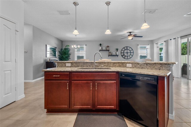 kitchen with ceiling fan with notable chandelier, light tile patterned floors, dishwasher, sink, and light stone counters