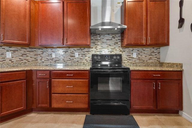 kitchen featuring tasteful backsplash, black / electric stove, light stone counters, and wall chimney exhaust hood