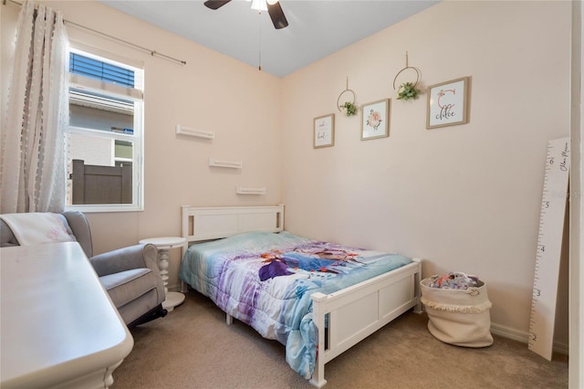 bedroom featuring ceiling fan and carpet floors