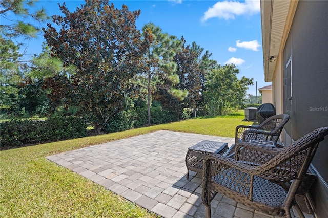 view of patio / terrace with central AC unit