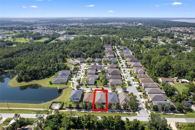 bird's eye view with a water view and a residential view