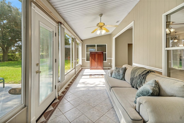 sunroom / solarium featuring vaulted ceiling and a ceiling fan