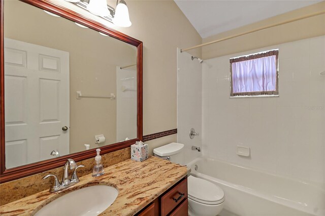 full bathroom with tub / shower combination, toilet, and vanity