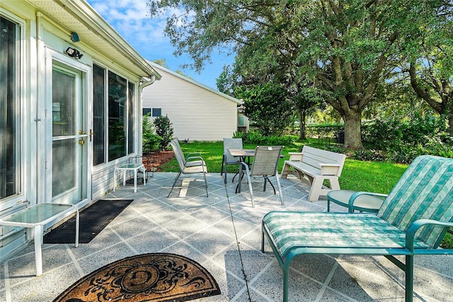 view of patio featuring outdoor dining area