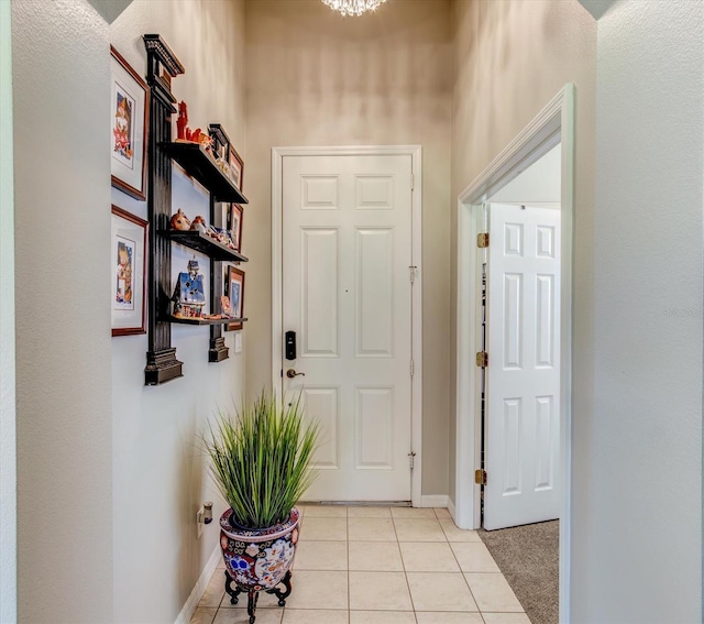 entryway featuring light tile patterned floors