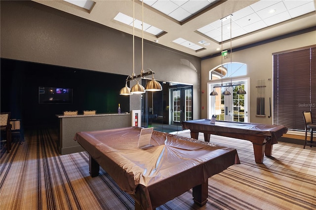 playroom featuring pool table, french doors, and a high ceiling