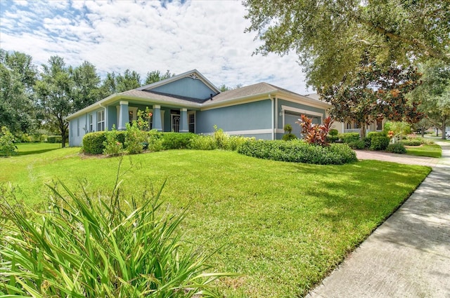 ranch-style home featuring a front yard