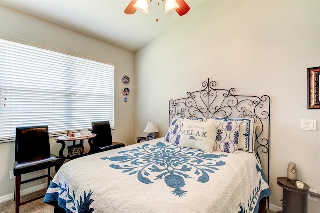 bedroom with ceiling fan, carpet, and lofted ceiling