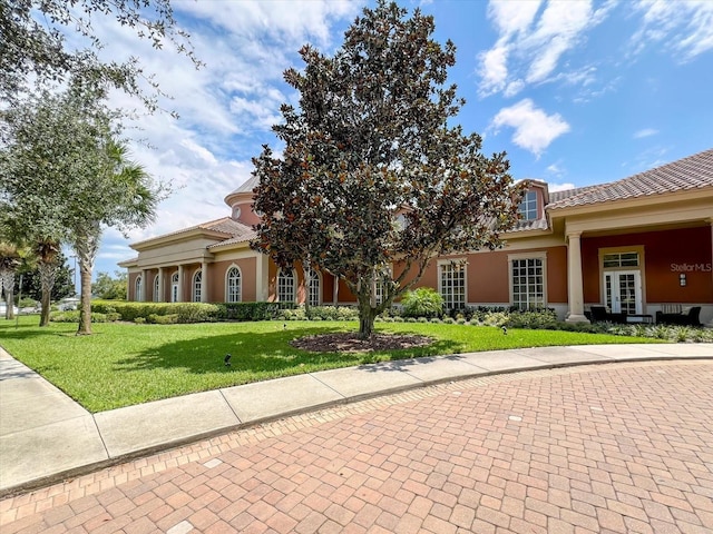 view of front of property with a front lawn