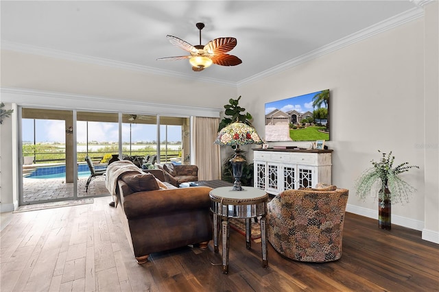 living room with ceiling fan, ornamental molding, and wood-type flooring