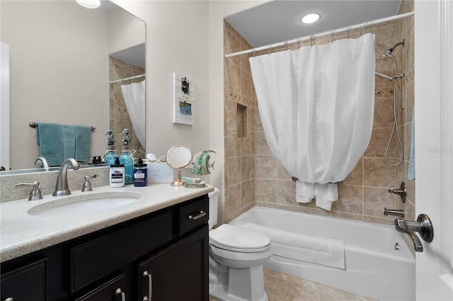 full bathroom featuring tile patterned floors, vanity, shower / tub combo, and toilet