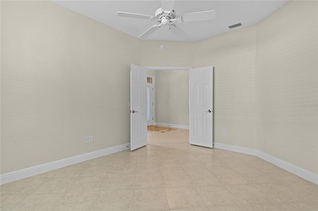 spare room featuring ceiling fan