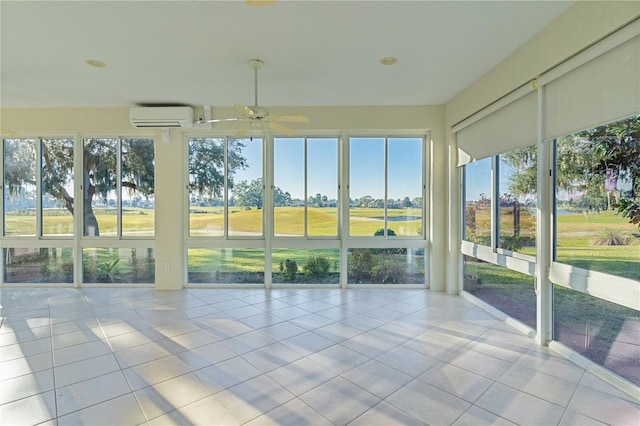 unfurnished sunroom with an AC wall unit and ceiling fan