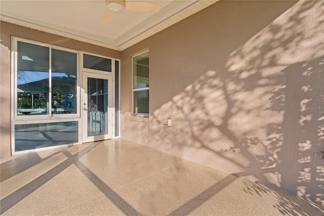 view of patio featuring ceiling fan