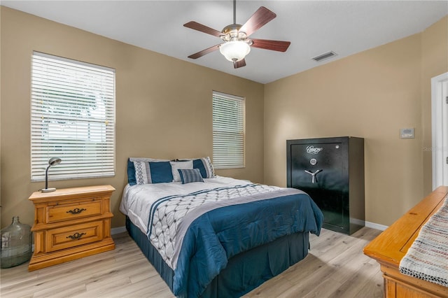 bedroom featuring ceiling fan and light hardwood / wood-style floors