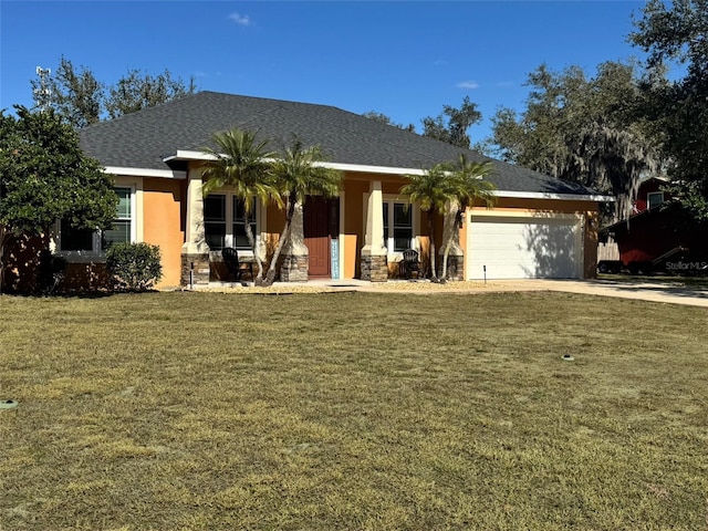 view of front of house with a garage, a front lawn, and a porch